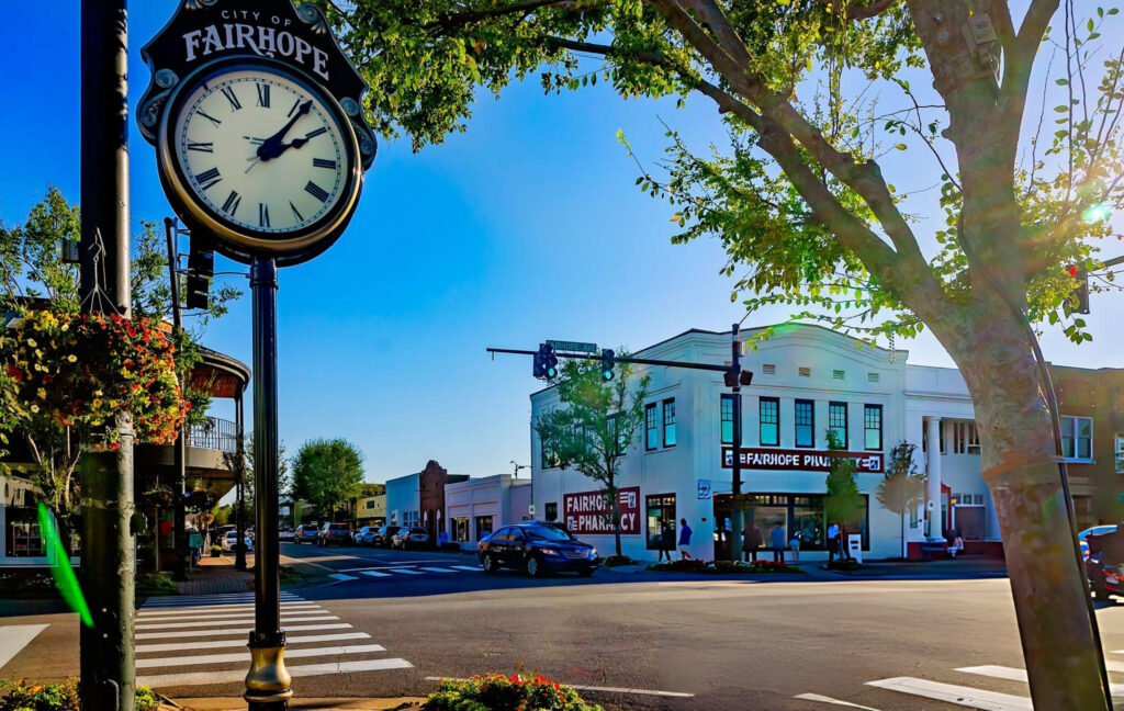 Fairhope, Alabama downtown with historic clock tower and Main Street storefronts